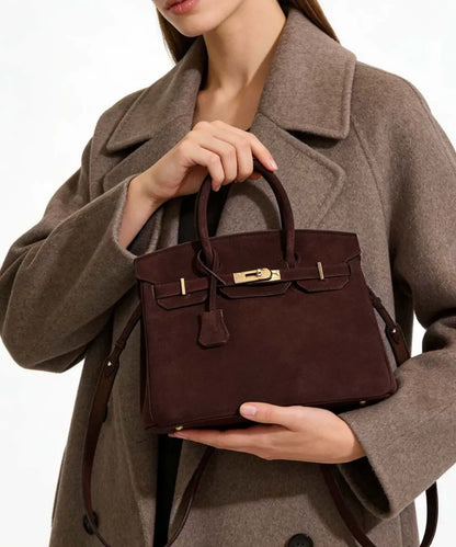 Florvane™ suede leather handbag