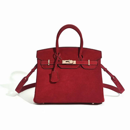 Florvane™ suede leather handbag