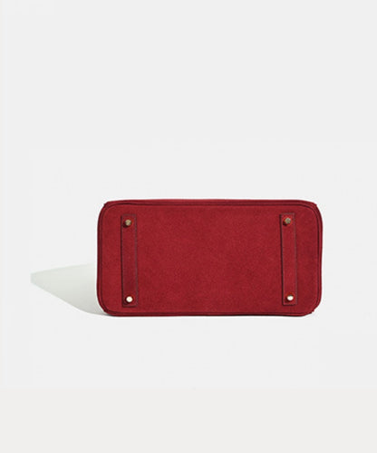 Florvane™ suede leather handbag