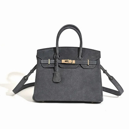 Florvane™ suede leather handbag