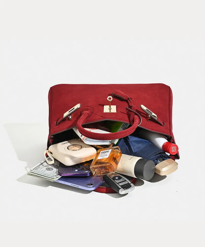 Florvane™ suede leather handbag