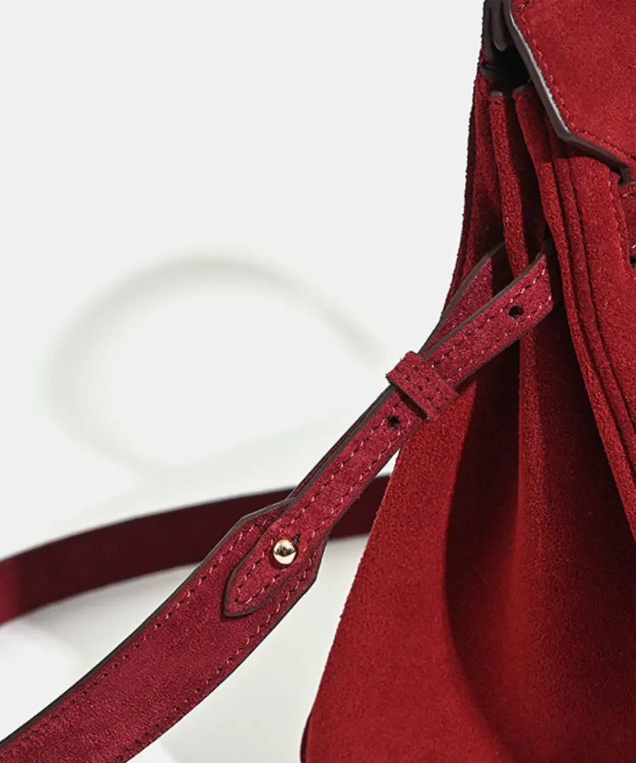 Florvane™ suede leather handbag