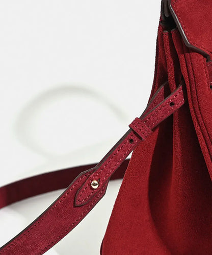 Florvane™ suede leather handbag